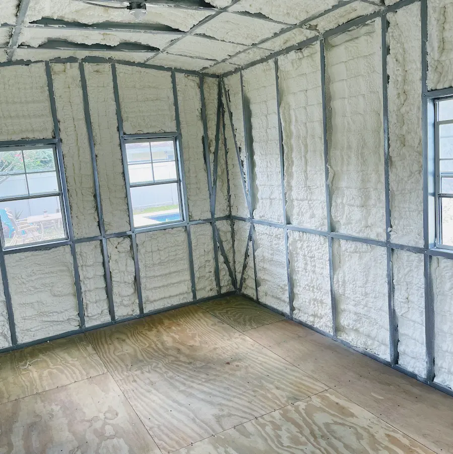Closed-cell spray foam insulation applied to wall cavities in a residential project in Wyndham