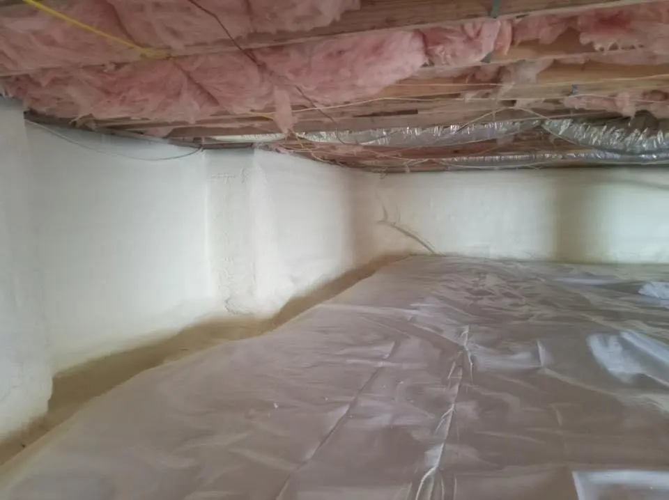 Crawl space encapsulation with closed-cell spray foam for Roof Waterproofing in Wyndham